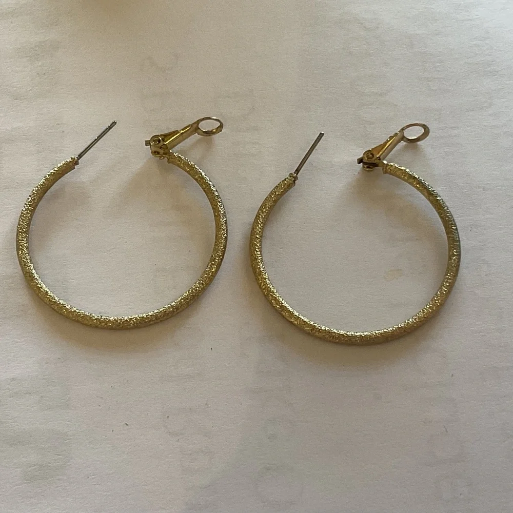 None hoop earrings